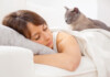 8 Reasons Why Your Cat Likes Sleeping on You